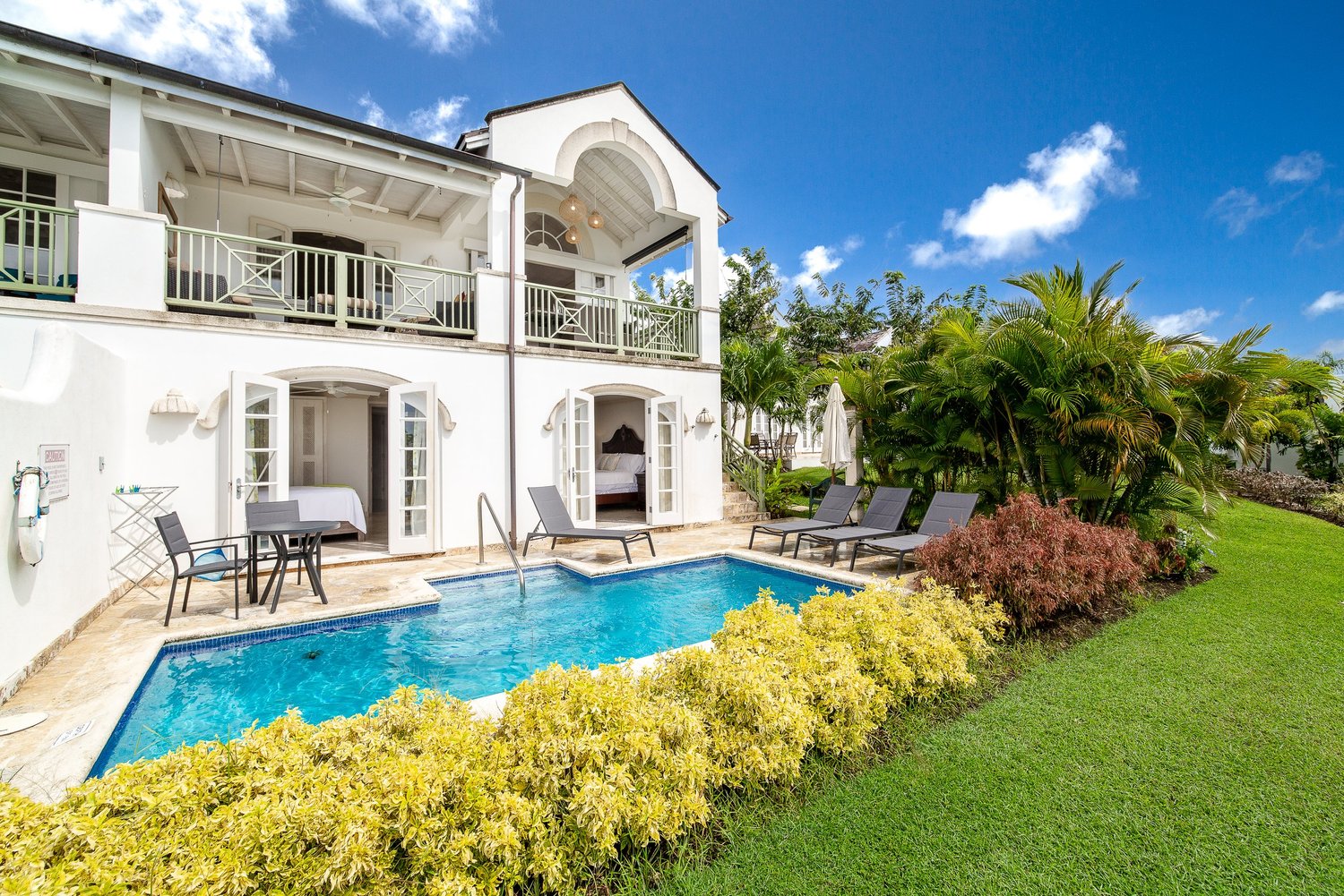 Villa Marica, its pool and tropical gardens at Royal Westmoreland
